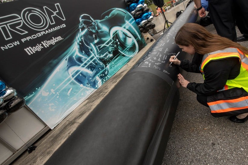 TronSteel05 – WDWINFO.COM Cast Members Sign Steel on TRON Attraction Construction The DIS TronSteel05