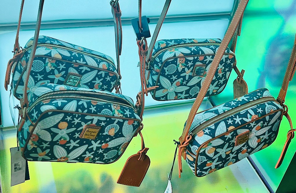 2024 FG Orange Bird Dooney Crossbody โ WDWINFO.COM So Much NEW Orange Bird Merch at EPCOT! 2024 FG Orange Bird Dooney Crossbody