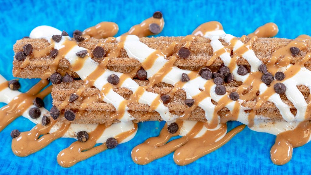 2024 Festival of Holidays Menus For Disney California Adventure 2024-disney-eats-foh-foodie-guide-DLR_DCA_FOOD_WilliesChurro_Fluffernutter_100221_02853DN-1536x864