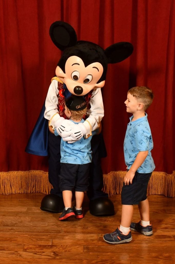 Boy meets Mickey Mouse