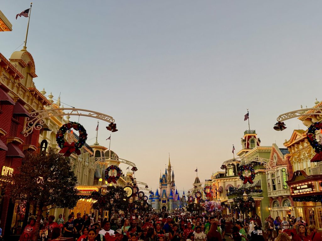 How to Enjoy Walt Disney World During Busy Holiday Crowds main street christmas magic kingdom _ chloe