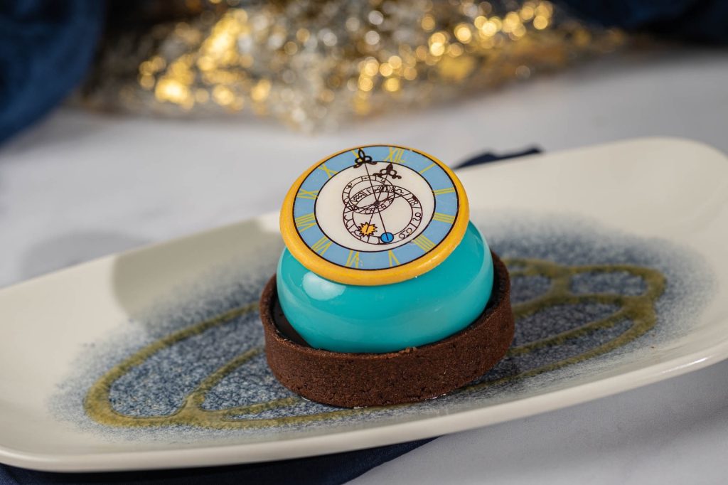 2025-WDW-WPW-Clock-Strikes-Twelv – WDWINFO.COM It’s World Princess Week at Disney & We Have NEW Food! 2025-WDW-WPW-Clock-Strikes-Twelv