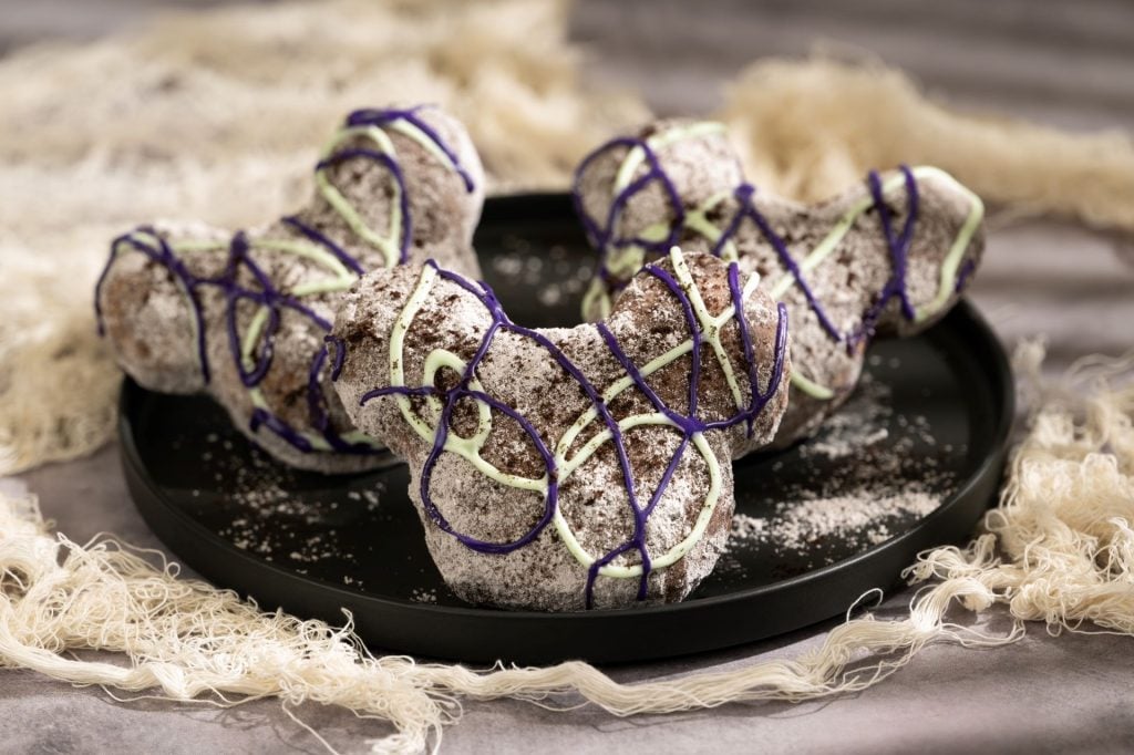 Ghoulish-Beignets-Walt-Disney-Wo โ WDWINFO.COM New 2025 Halloween Snacks Coming to Walt Disney World Resort Hotels Ghoulish-Beignets-Walt-Disney-Wo