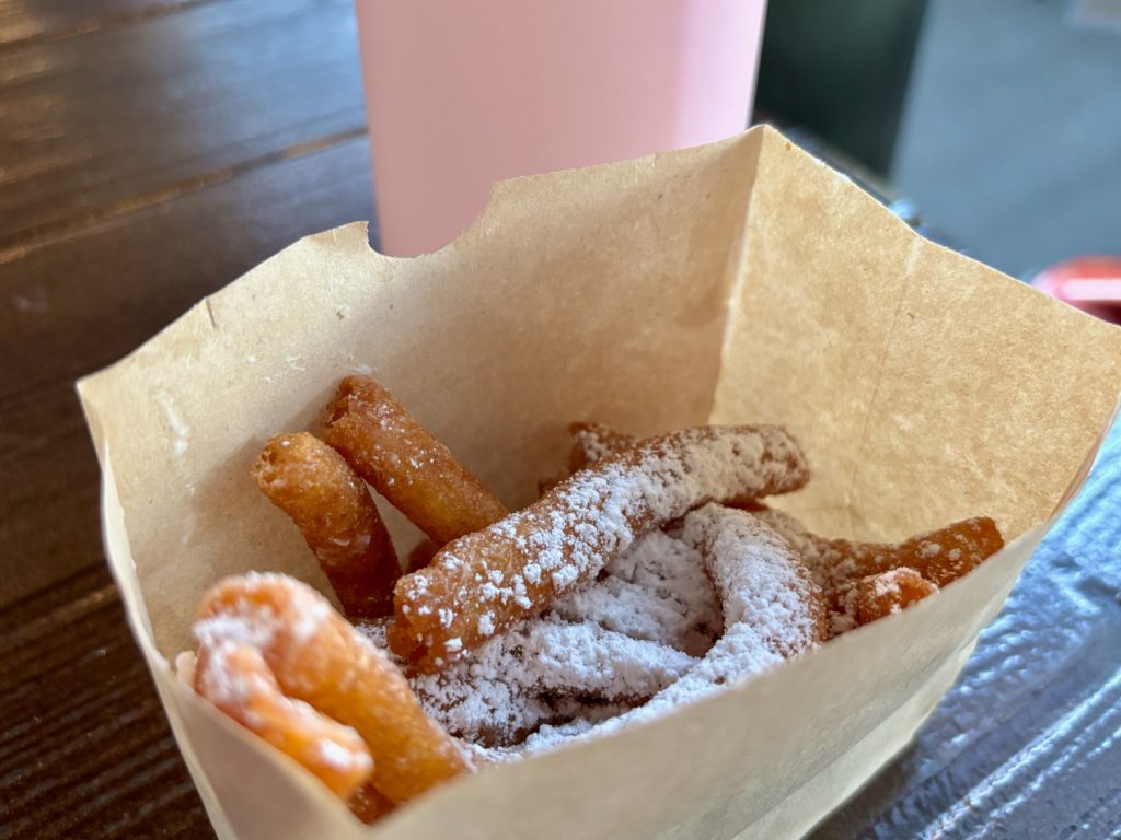 dlr-hungry-bear-bbq-jamboree-funnel-cake-fries-02 – WDWINFO.COM Could This Be the BEST Sweet Snack at Disneyland? dlr-hungry-bear-bbq-jamboree-funnel-cake-fries-02