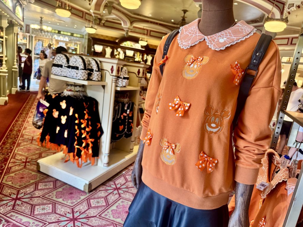 New Mickey Pumpkin Apparel Collection Now Available at Disney World her universe disney parks mickey pumpkin apparel 7