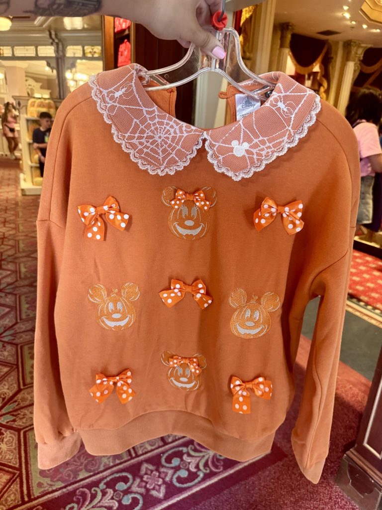 New Mickey Pumpkin Apparel Collection Now Available at Disney World her universe disney parks mickey pumpkin apparel 8