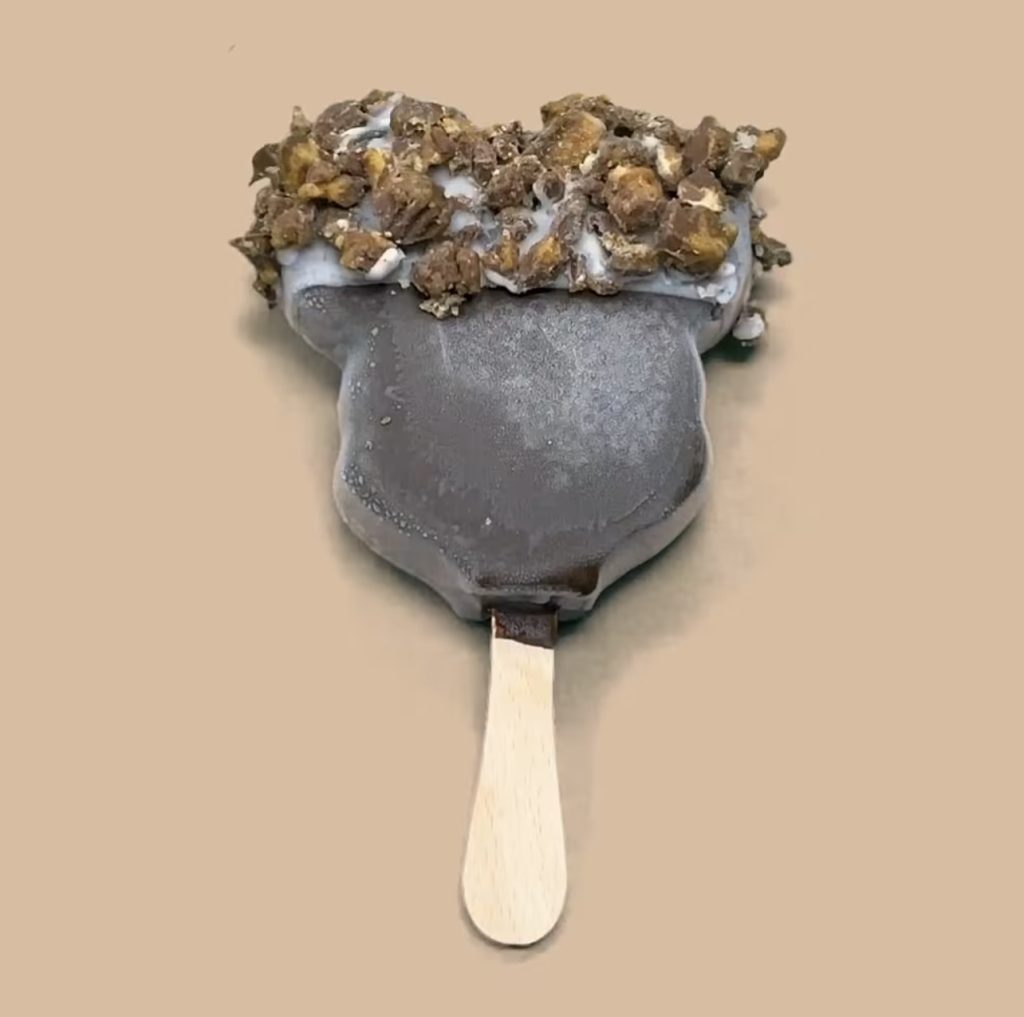 Dipped Mickey Bar 2 โ WDWINFO.COM Candy-Coated, Dipped Mickey Ice Cream Bars NOW Available at Disney World Dipped Mickey Bar 2
