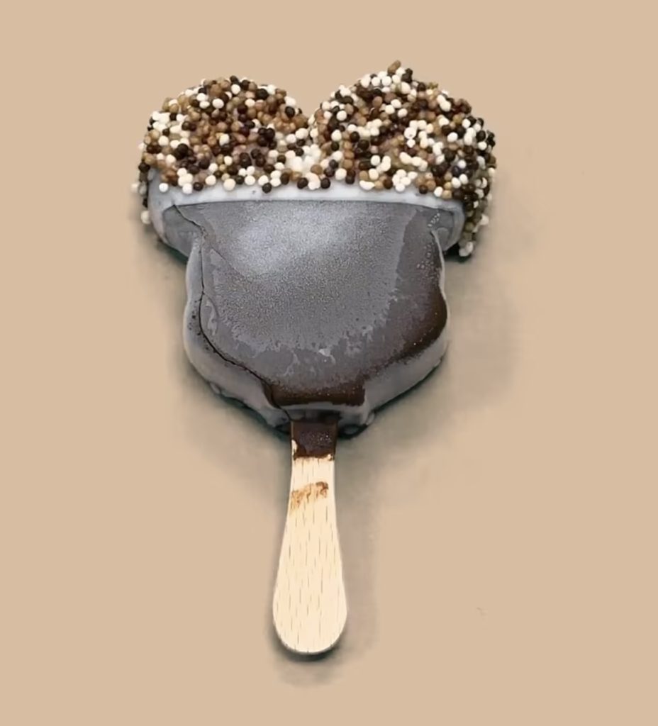 Dipped Mickey Bar 3 โ WDWINFO.COM Candy-Coated, Dipped Mickey Ice Cream Bars NOW Available at Disney World Dipped Mickey Bar 3