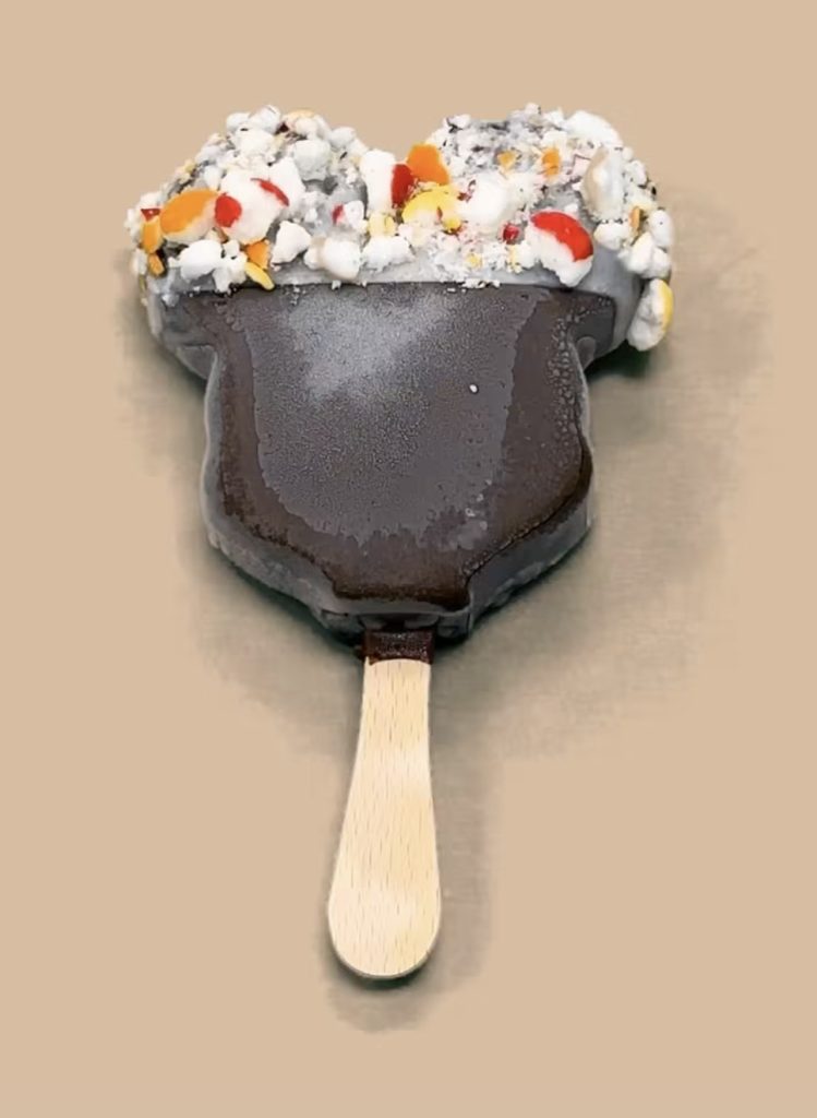 Dipped Mickey Bar 4 โ WDWINFO.COM Candy-Coated, Dipped Mickey Ice Cream Bars NOW Available at Disney World Dipped Mickey Bar 4
