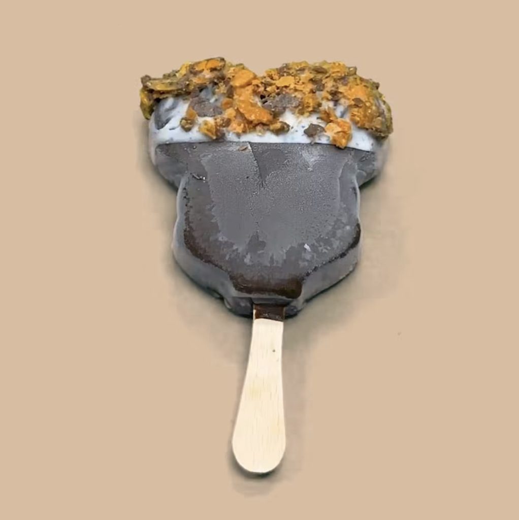 Dipped Mickey Bar 7 โ WDWINFO.COM Candy-Coated, Dipped Mickey Ice Cream Bars NOW Available at Disney World Dipped Mickey Bar 7