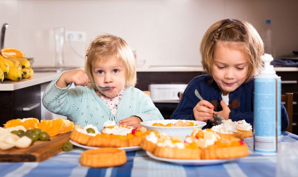 Tips for Dining with Kids at Disney World’s Table-Service Restaurants kids-eating-table-home
