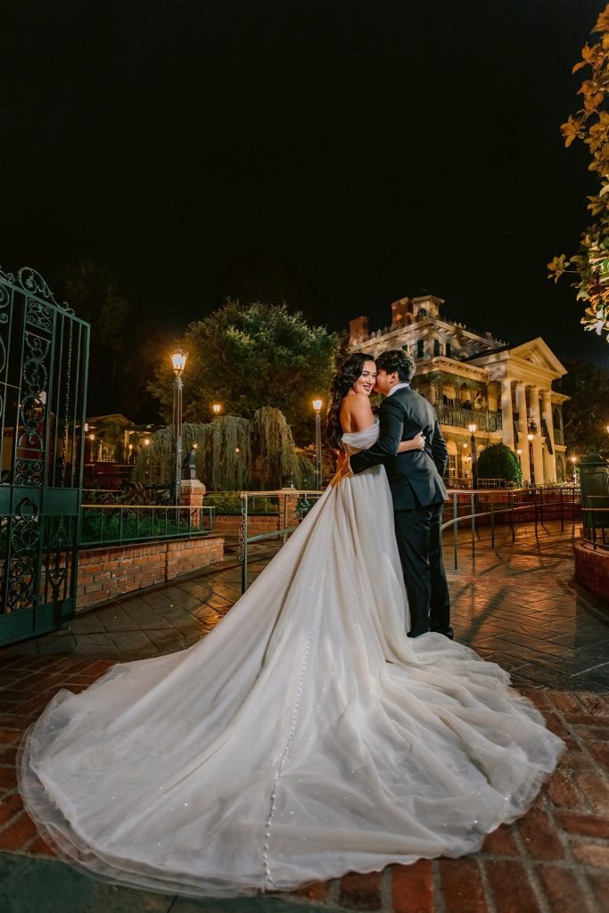 2026-DFTWH-35th-Anniversary-Haun 2 – WDWINFO.COM Haunted Mansion Courtyard to Begin Hosting Weddings at Disneyland 2026-DFTWH-35th-Anniversary-Haun 2