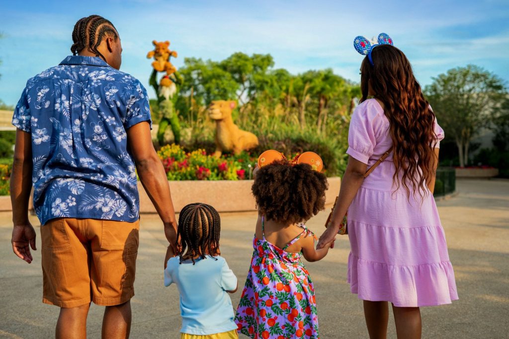 Family-at-EPCOT-Flower-and-Garde – WDWINFO.COM Fresh Details Bloom for EPCOT Flower & Garden Festival 2026 Family-at-EPCOT-Flower-and-Garde