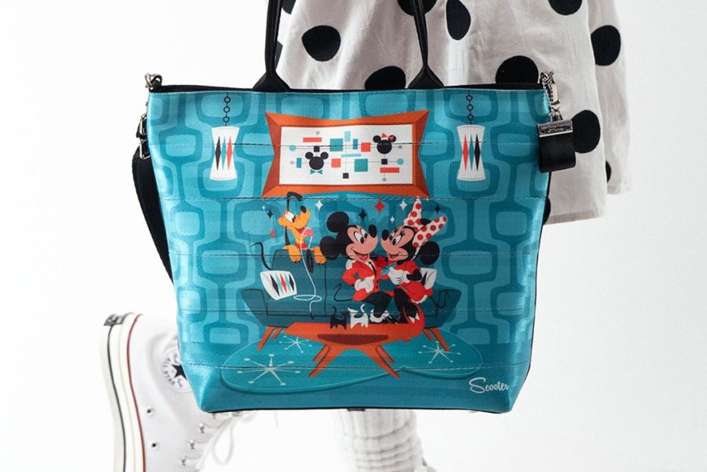 Mid-Century Magic Comes to EPCOT With New Art of Scooter Tote art-of-scooter-harveys-seatbelt-bag
