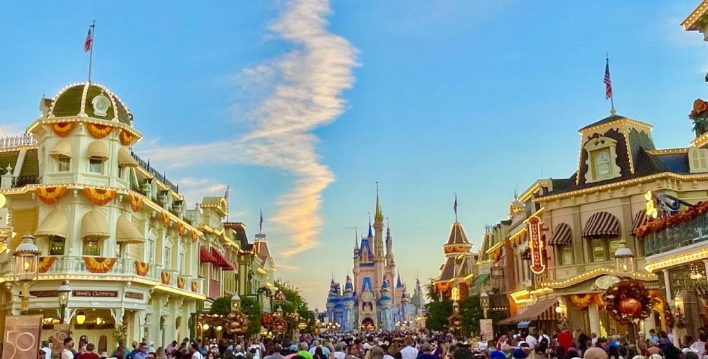 Walt Disney World Raises Ticket, Annual Pass & Quick-Service Dining Prices cinderella castle-50th-annivesary-magic kingdom-chloe-2021