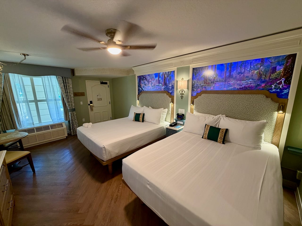 Royal Guest Room with two queen beds and themed headboards