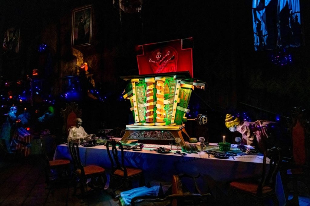 Halloween Time at the Disneyland Resort - Haunted Mansion Holiday | WDWINFO.COM Haunted Mansion Holiday 25th Anniversary: New Merch & More Halloween Time at the Disneyland Resort - Haunted Mansion Holiday haunted mansion During Halloween Time at Disneyland Resort, which begins Aug. 21, 2026, guests can view a 10-foot-tall gingerbread house inside of the ballroom of Haunted Mansion Holiday in Disneyland park in Anaheim, Calif. Celebrating 25 years of showstopping confectionary creations in the attraction, this year's gingerbread house takes the form of a delightfully monstrous music box, decorated with grinding gears, turning tines and frightfully festive details. Guests can experience Haunted Mansion Holiday during Halloween Time and through the holiday season at the Disneyland Resort. (David Nguyen/Disneyland Resort)