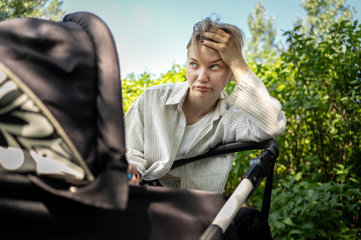 8 Ways to Reset When Your Disney World Day Goes Sideways frustrated-woman-stroller-AdobeStock_1738955061