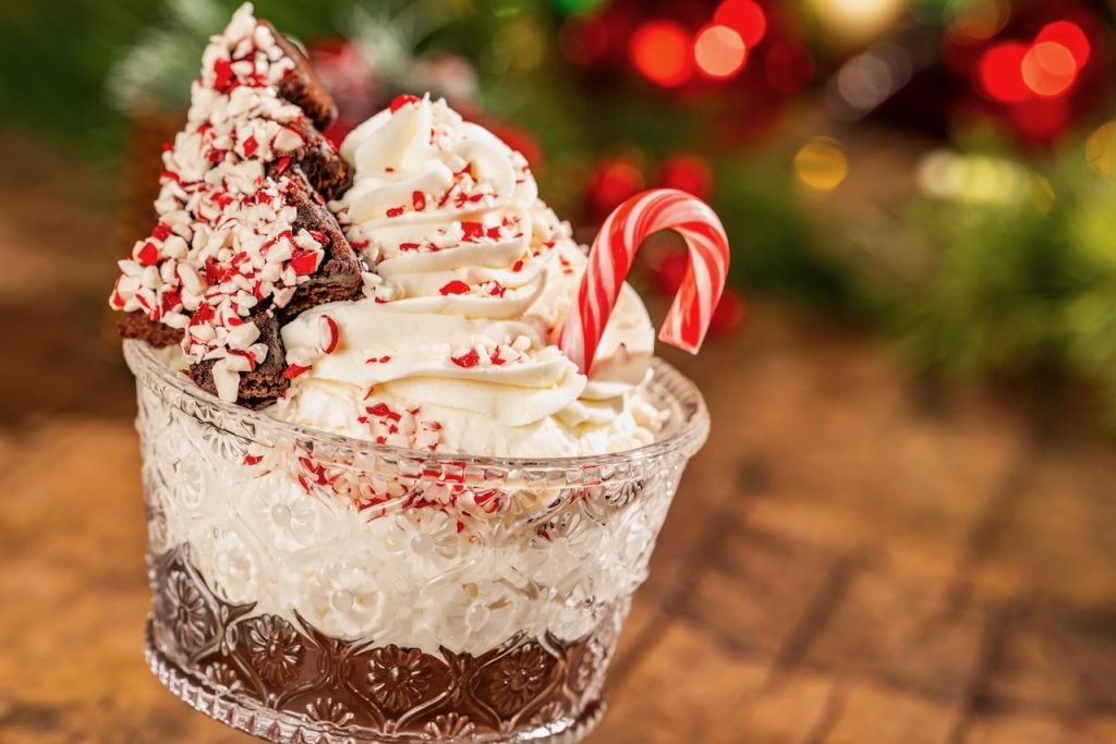 2026-WDW-MVMCP-Foodie-Guide-BrownieSundae | WDWINFO.COM The 2026 Mickey’s Very Merry Christmas Party Foodie Guide is HERE! 2026-WDW-MVMCP-Foodie-Guide-BrownieSundae