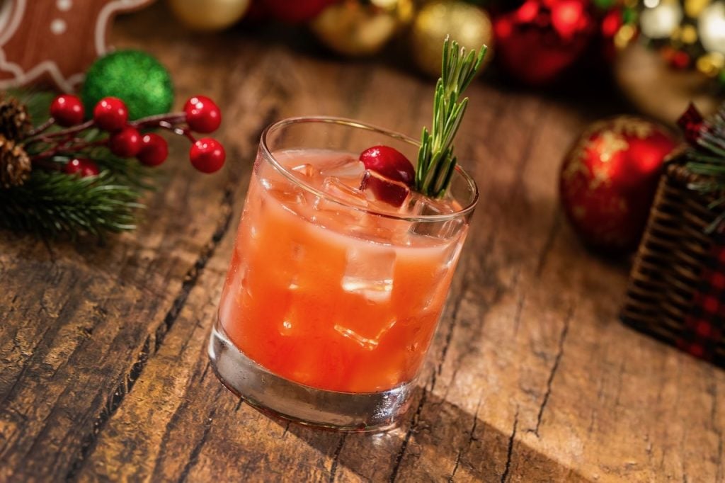 2026-WDW-MVMCP-Foodie-Guide-CranberryCocktail | WDWINFO.COM The 2026 Mickey’s Very Merry Christmas Party Foodie Guide is HERE! 2026-WDW-MVMCP-Foodie-Guide-CranberryCocktail