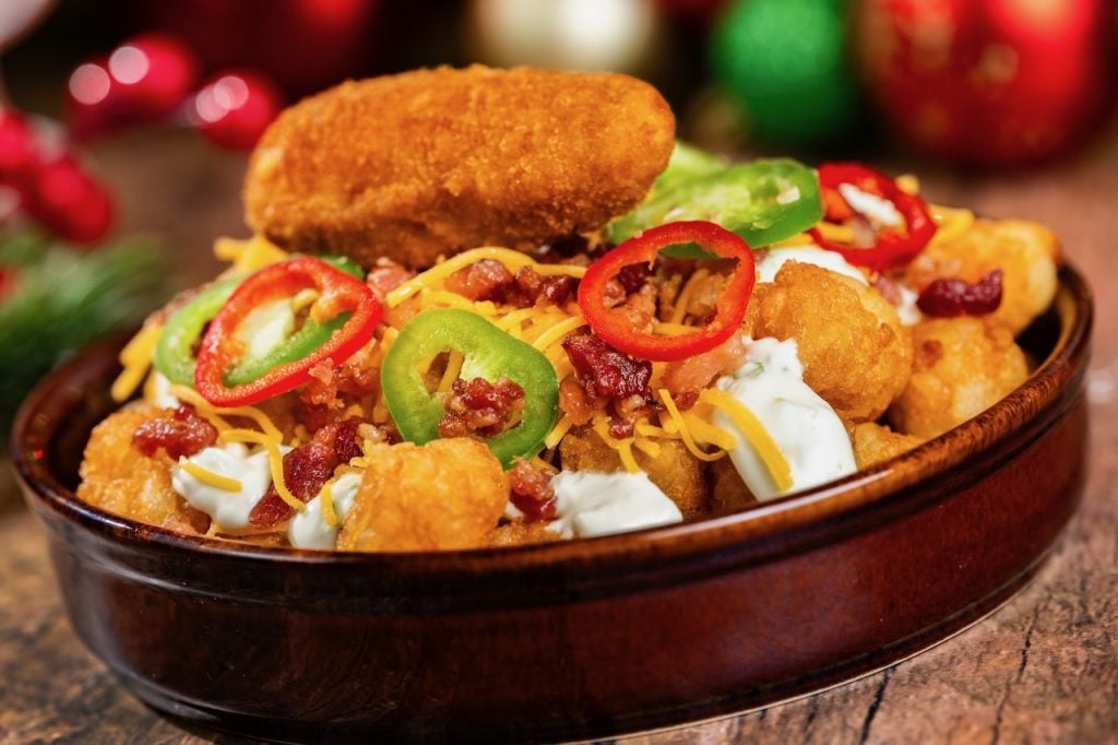2026-WDW-MVMCP-Foodie-Guide-JalapenoTots | WDWINFO.COM The 2026 Mickey’s Very Merry Christmas Party Foodie Guide is HERE! 2026-WDW-MVMCP-Foodie-Guide-JalapenoTots