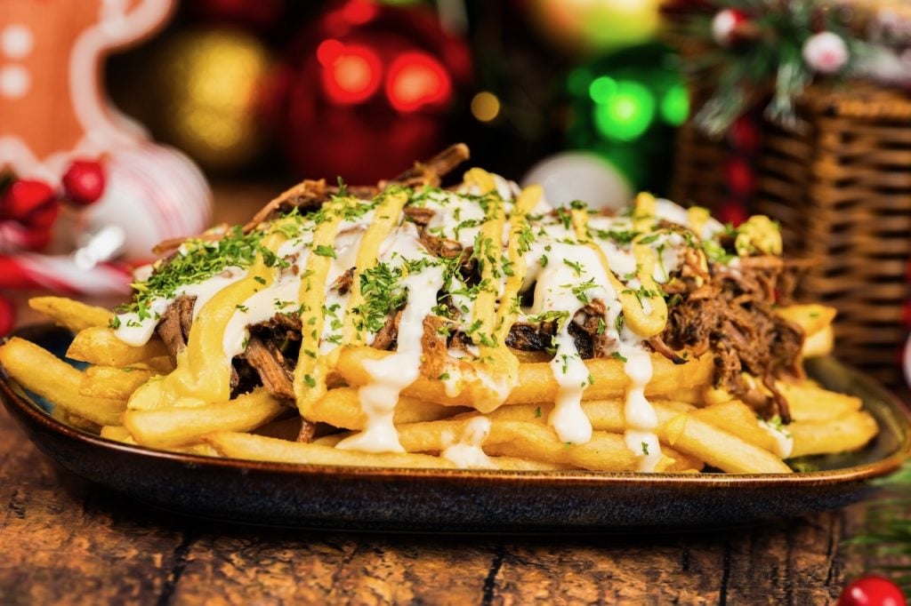 2026-WDW-MVMCP-Foodie-Guide-LoadedFries | WDWINFO.COM The 2026 Mickey’s Very Merry Christmas Party Foodie Guide is HERE! 2026-WDW-MVMCP-Foodie-Guide-LoadedFries