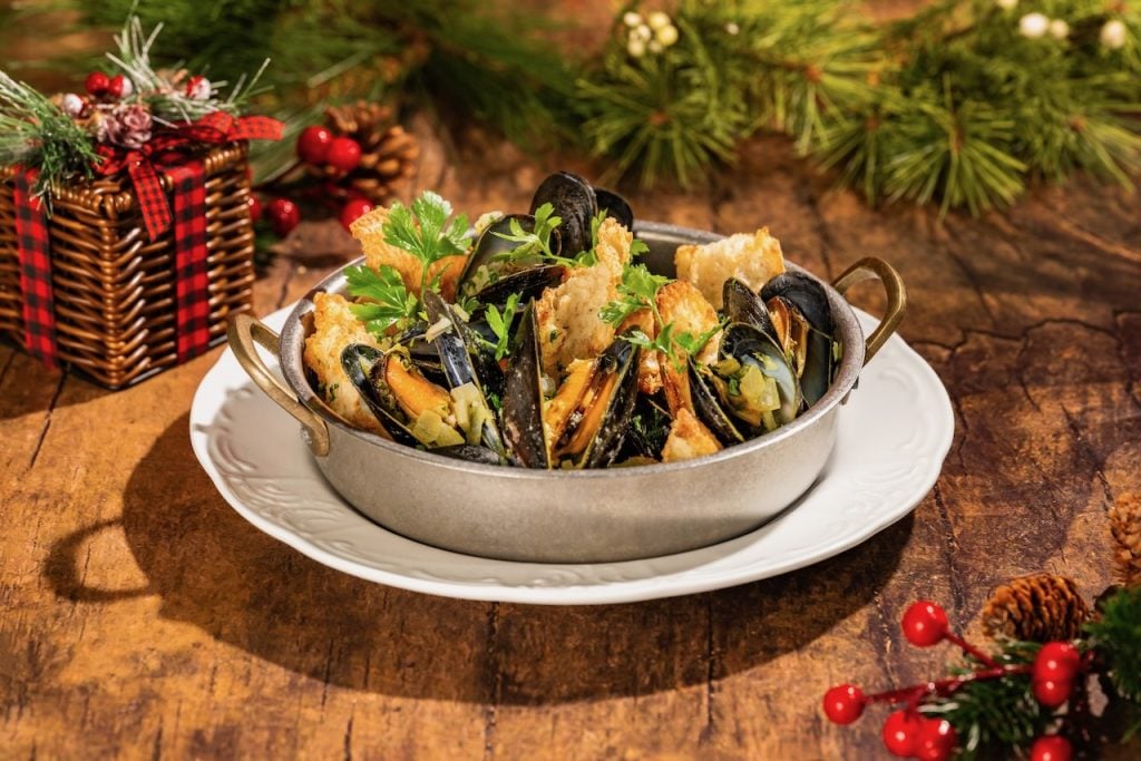 2026-WDW-MVMCP-Foodie-Guide-MoulesMariniere | WDWINFO.COM The 2026 Mickey’s Very Merry Christmas Party Foodie Guide is HERE! 2026-WDW-MVMCP-Foodie-Guide-MoulesMariniere
