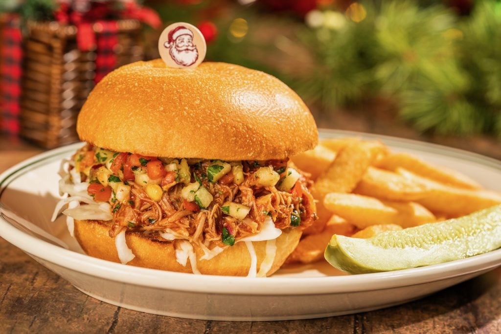 2026-WDW-MVMCP-Foodie-Guide-PulledPorkSandwich | WDWINFO.COM The 2026 Mickey’s Very Merry Christmas Party Foodie Guide is HERE! 2026-WDW-MVMCP-Foodie-Guide-PulledPorkSandwich
