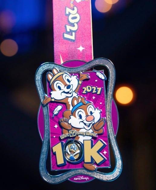 Screenshot | WDWINFO.COM FIRST LOOK: 2027 Walt Disney World Marathon Weekend Medals Revealed! Screenshot Screenshot