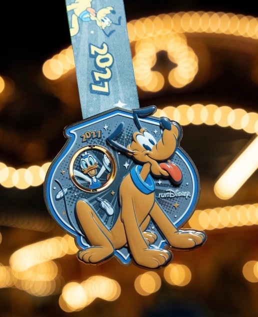 Screenshot | WDWINFO.COM FIRST LOOK: 2027 Walt Disney World Marathon Weekend Medals Revealed! Screenshot Screenshot