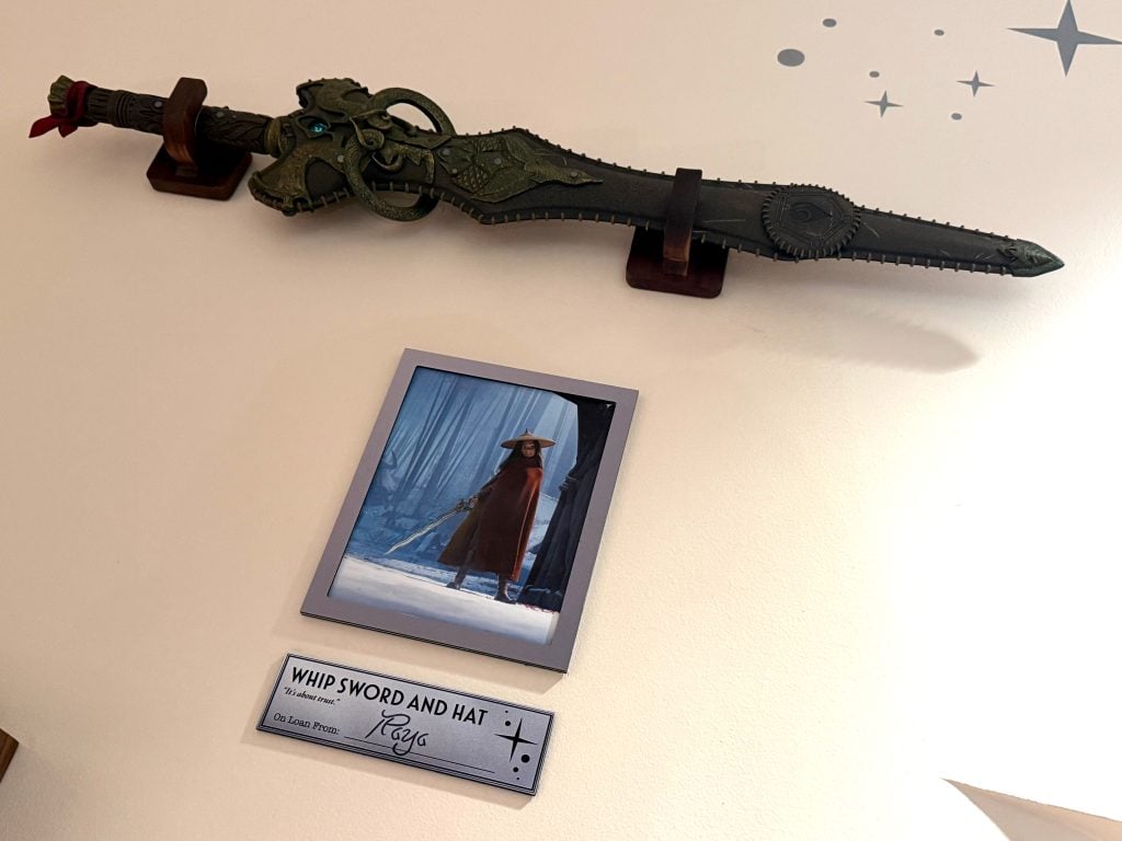 raya whip sword | WDWINFO.COM Did You See These Easter Eggs in the Magic of Animation Building? raya whip sword