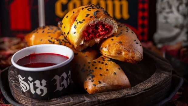 Six Ravens Debuts Their First Limited-Edition Halloween Coffyn at Disney Springs! redrum coffyn six ravens oct 2026 cropped